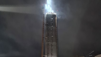 The work has been going on around the clock for three months. One concrete truck per hour has delivered material to the tower.